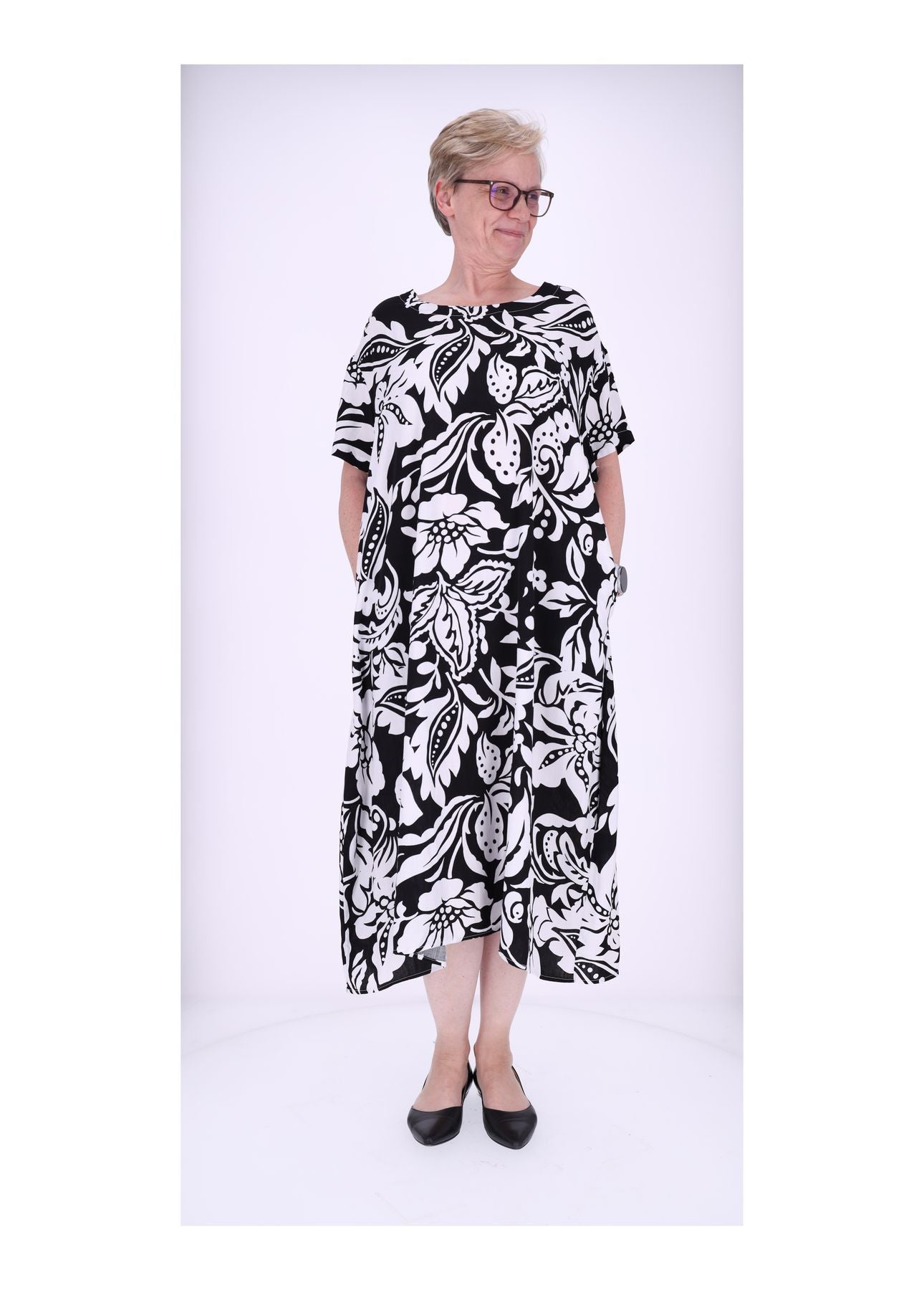 Damen Kleid Rundhals seitliche Einschubtaschen