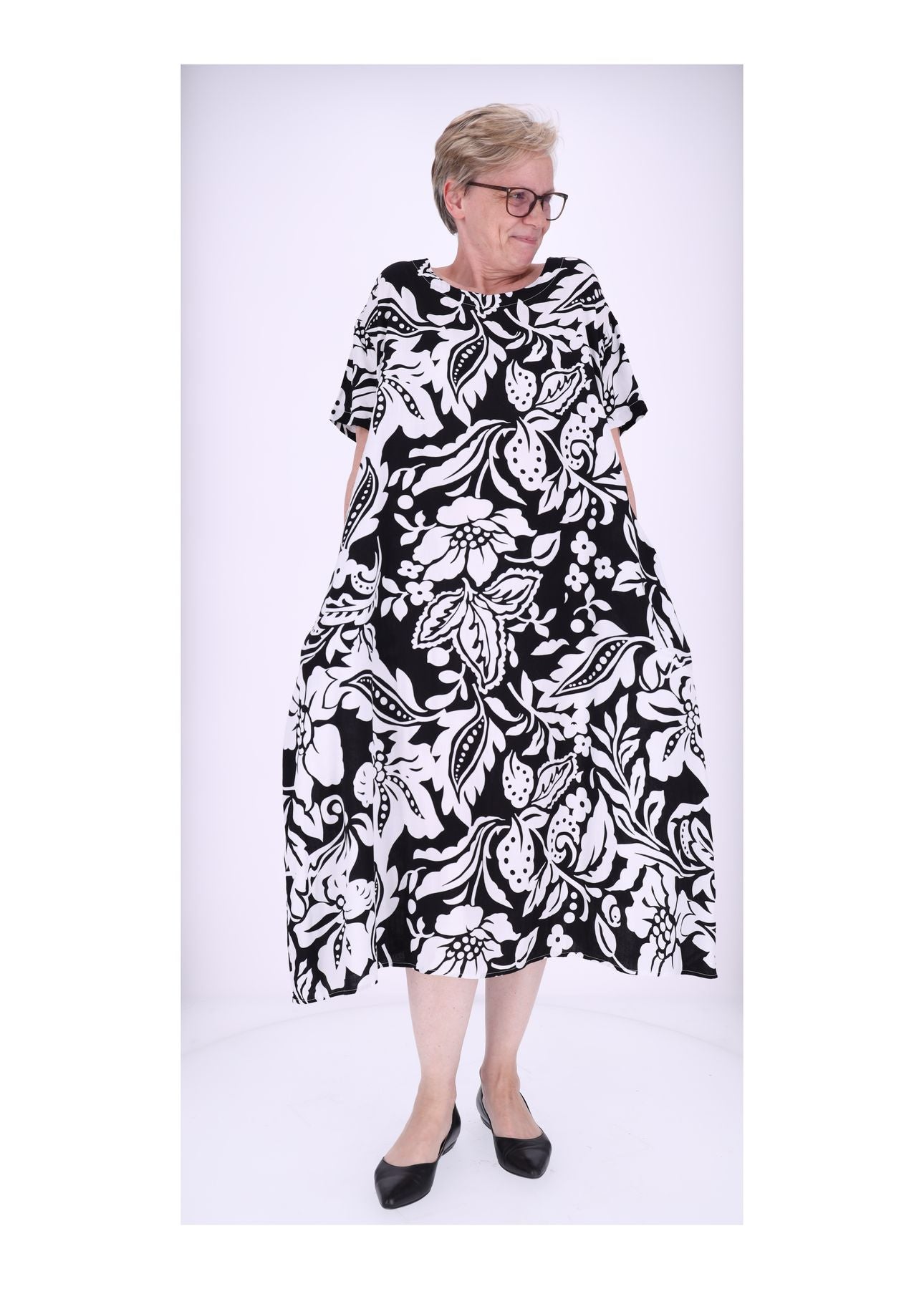 Damen Kleid Rundhals seitliche Einschubtaschen