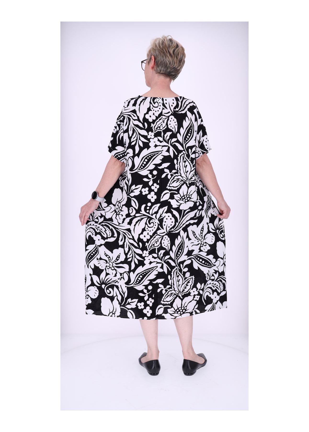 Damen Kleid Rundhals seitliche Einschubtaschen