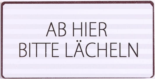 AB HIER BITTE LÄCHELN