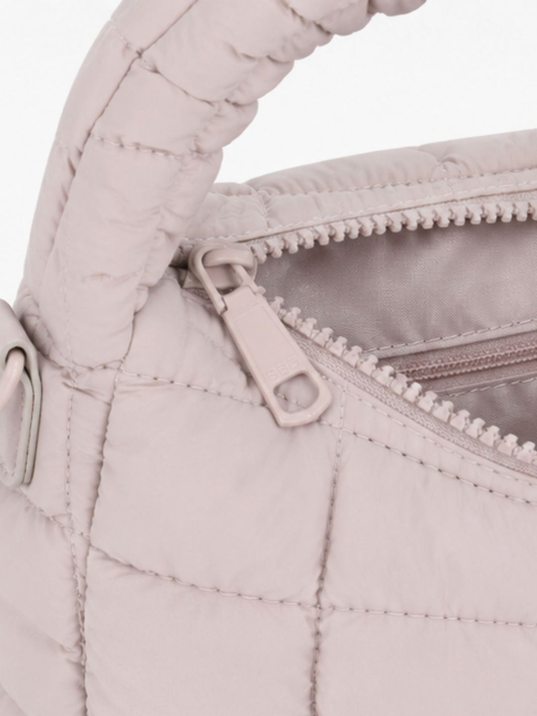 Tasche Puffer Hänkel und Riemen