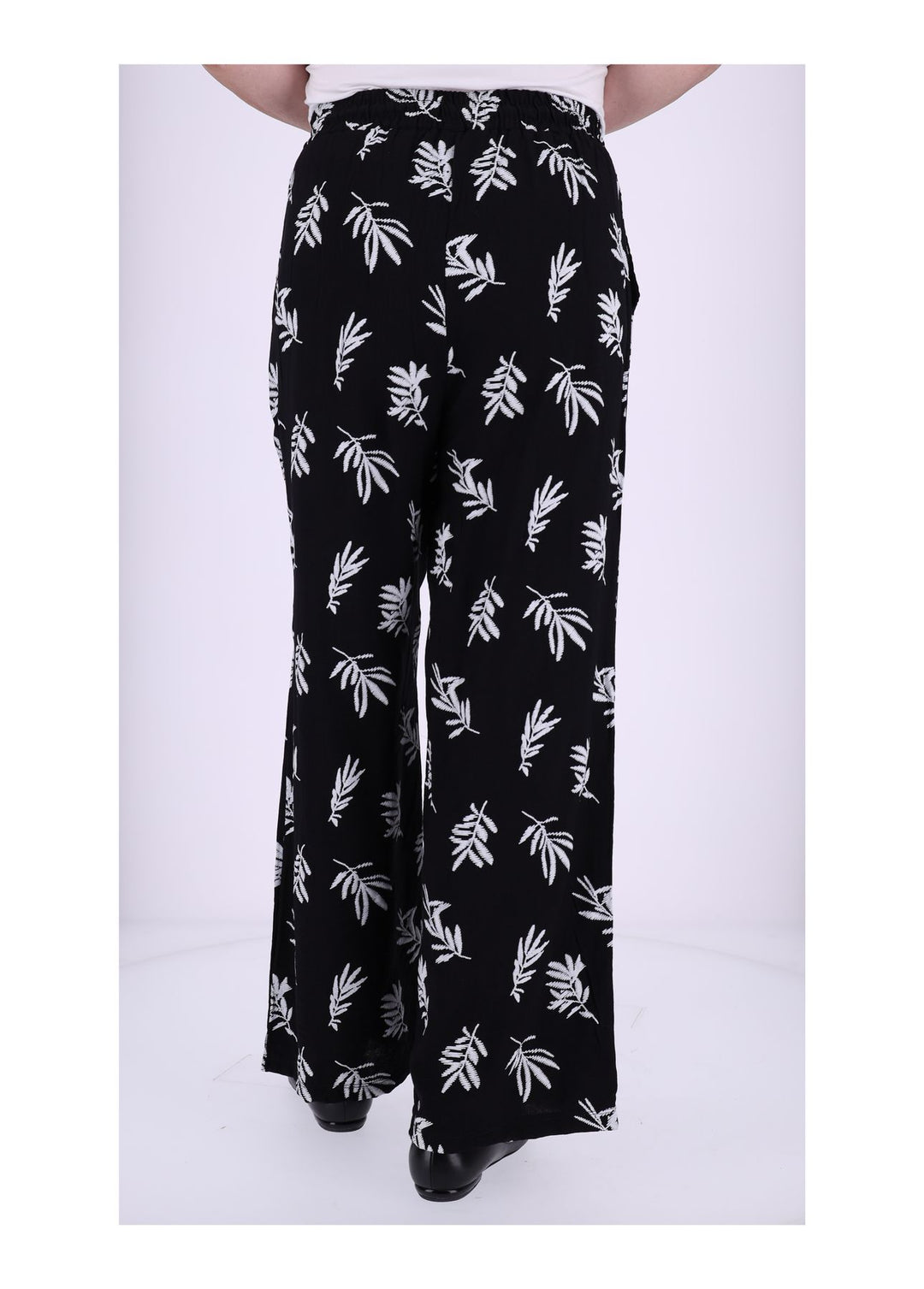 Damen Schlupfhose mit Palmwedel-Print – Schwarz